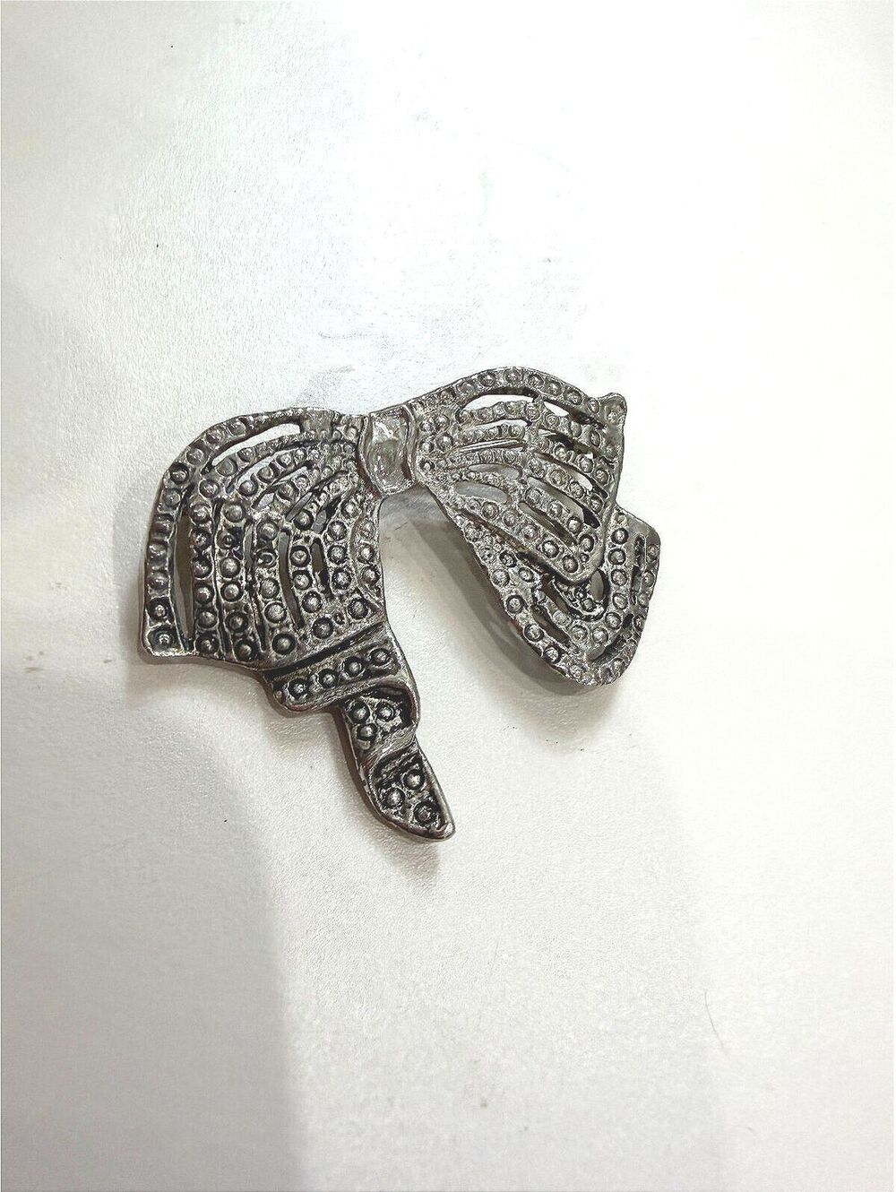 Vintage Silver-Tone Bow Brooch Pin with Textured Detailing